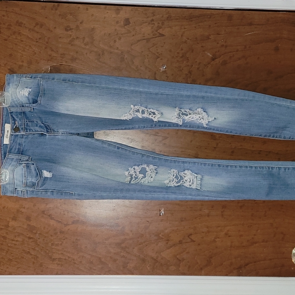 Distressed straight leg jean